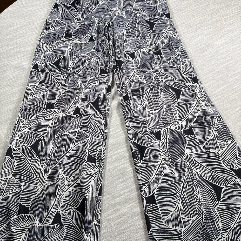 Arolina Small Flared Palazzo Resort Wear in black and white with a palm pattern - Picture 2 of 7